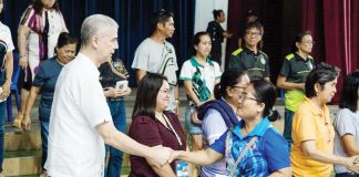 Barangay violence against women desk officers from the 4th District of Negros Occidental receive mobile phones from the provincial government to enhance communication in their vital roles in addressing violence against women and children. THE CITYBRIDGE/FACEBOOK PHOTO