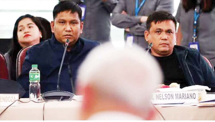 Witness Police Lieutenant Colonel Santie Mendoza (left) and Nelson Mariano testify before the House quad committee. NIÑO JESUS ORBETA