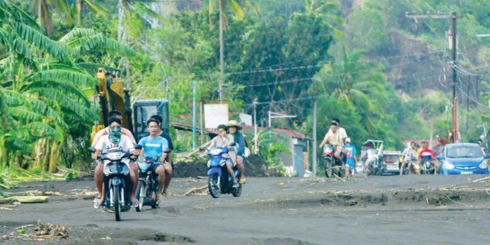 Mud and debris cover the Agoncillo-Laurel Road in Agoncillo, Batangas, unreached by clearing groups due to cut off ends from Barangay Subic Ilaya and Laurel, Batangas after intense rains brought by Tropical Storm Kristine caused landslides and massive flooding in the area. MARK DEMAYO/ABS-CBN NEWS PHOTO