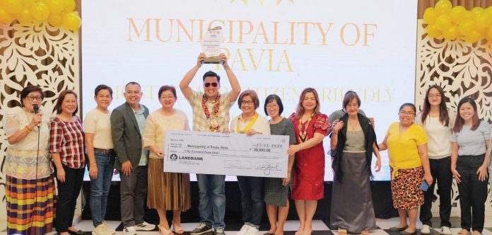 ime_Pavia_resized Mayor Laurence Anthony Gorriceta of Pavia, Iloilo, proudly accepts a plaque and a P50,000 cash prize as his town is honored as the “Most Senior Citizen-Friendly Municipality” in Iloilo Province. PHOTO FROM BALITA HALIN SA KAPITOLYO