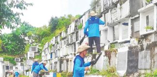 Members of the Roxas City Groundskeeper and Clean-up Crew headed by Joel Daria helped clean the Banica Public Cemetery ahead of the observance of All Saints’ Day (November 1) and All Souls' Day (November 2). MAYOR RONNIE DADIVAS/FACEBOOK PAGE PHOTO