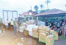 Three men were arrested on Tuesday, Oct. 29, 2024, with P2,340,000 worth of smuggled cigarettes in an anti-smuggling operation in Binalbagan, Negros Occidental. REGIONAL MARITIME UNIT 6 PHOTO