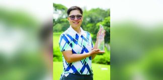 Sarah Ababa displays her championship trophy. PHOTO COURTESY OF ICTSI