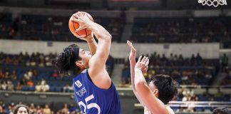 Ateneo de Manila University Blue Eagles’ Kristian Porter pulls up for a shot against a National University Bulldogs’ defender. UAAP PHOTO