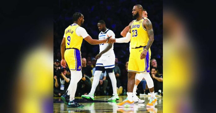 sports LeBron 1_superimposed Los Angeles Lakers’ LeBron James and Bronny James officially became the first father and son to play in the NBA together. PHOTO COURTESY OF LA LAKERS' X ACCOUNT