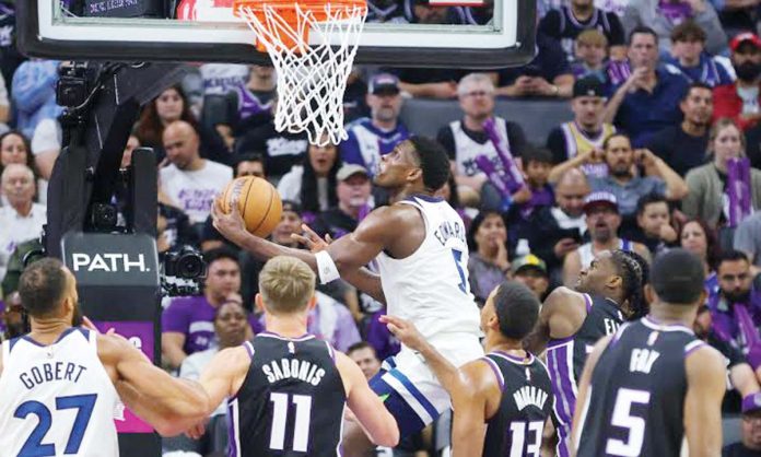 sports-NBA Minnesota Timberwolves’ Anthony Edwards goes for a reverse layup. PHOTO COURTESY OF ATHLON SPORTS