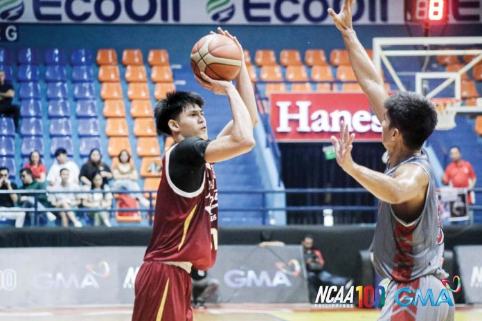sports-NCAA-1 University of Perpetual Help Altas’ John Boral pulls up for a shot against the defense of Lyceum of the Philippines Pirates’ Ato Barba. Photo courtesy of NCAA/GMA sports