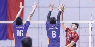 D’Navigators-Iloilo’s Edward Camposano tries to score against the defense of Criss Cross King Crunchers’ Ysay Marasigan. PHOTO COURTESY OF SPIKERS’ TURF
