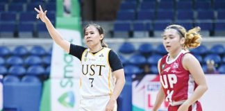 Ilongga Ana Tacatac of the University of Santo Tomas Growling Tigresses gestures after converting a three-pointer. UAAP PHOTO