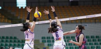Negrense Erika Jin Deloria of Biñan Tatak Gel 1-Pacman Partylist Volley Angels smashes the ball against the two Negros-ICC Blue Hawks defenders. MPVA PHOTO