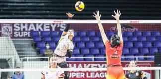 University of Santo Tomas Golden Tigresses’ Angeline Poyos goes for an attack. SSL PHOTO