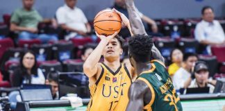University of Santo Tomas Growling Tigers’ Miguel Pangilinan pulls up for a shot against the defense of Far Eastern University Tamaraws’ Mo Konateh. UAAP PHOTO