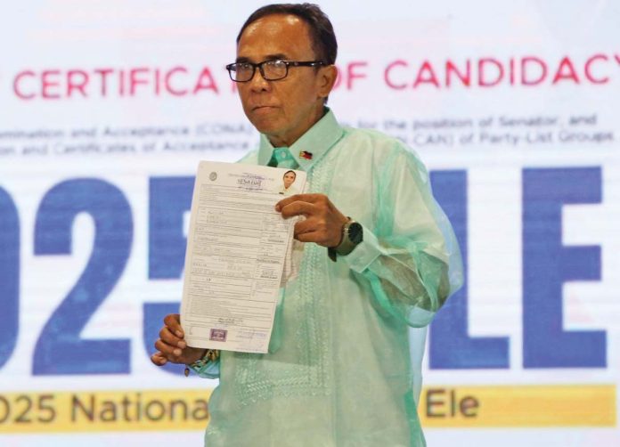Daniel Magtira flashes his Certificate of Candidacy for a Senate seat after filing it last month. He then said he wanted to marry presidential sister and senator Imee Marcos. PHOTO COURTESY OF JONAS SULIT/ABANTE NEWS ONLINE