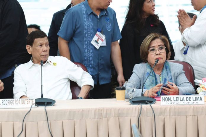 Duterte_1_resized Former President Rodrigo Duterte was seated beside former senator Leila De Lima during the House of Representatives’ probe on drug war killings during his administration. PHOTO COURTESY OF THE HOUSE OF REPRESENTATIVES