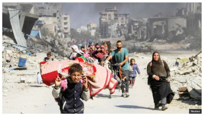 Gaza_1_resized Displaced Palestinians make their way in Gaza City after fleeing northern Gaza amid an Israeli ground offensive. As many as 130,000 Palestinians have been displaced by an Israeli ground offensive in northern Gaza since October. REUTERS