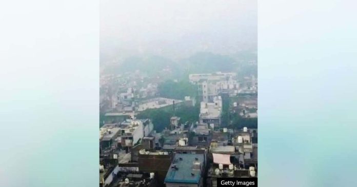 India-1_superimposed An aerial view of New Delhi’s built-up houses are barely visible as they are engulfed in smog. GETTY IMAGES