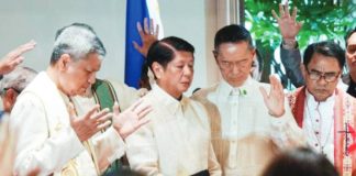 Various religious leaders pray with President Ferdinand “Bongbong” Marcos Jr. during the 49th Philippine National Prayer Breakfast on Monday. “Our collective faith and prayer to the Almighty is the most powerful tool that we have to weather these storms and the destruction that they bring,” says the President. PCO