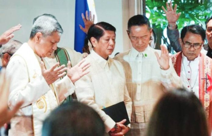 PBBM pray 1 Various religious leaders pray with President Ferdinand “Bongbong” Marcos Jr. during the 49th Philippine National Prayer Breakfast on Monday. “Our collective faith and prayer to the Almighty is the most powerful tool that we have to weather these storms and the destruction that they bring,” says the President. PCO