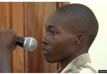Ugandan TikToker jailed for insulting president Emmanuel Nabugodi, Ugandan TikToker who has been jailed, holds a microphone in court. He created a mock trial of President Yoweri Museveni. SWAIBU IBRAHIM / BBC
