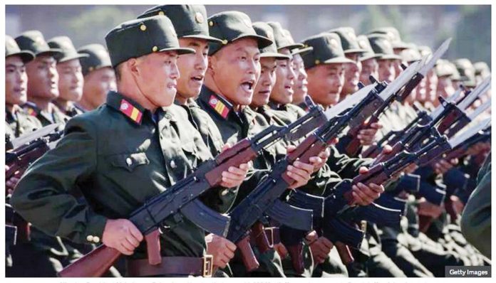 Ukraine-1 North Korean soldiers march during a mass rally. GETTY IMAGES