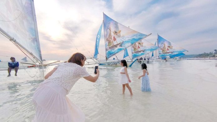 boracay_pic_resized_resized Colorful boats are set to sail on the waters of Boracay Island in Malay, Aklan. According to the Caticlan Boracay Transport Multi-Purpose Cooperative, boat services are not merely businesses but vital sources of livelihood for the workers on the world-famous island. WALT DISNEY STUDIOS PHOTO