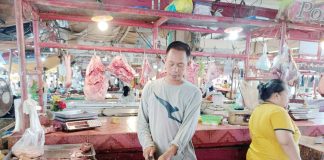 The Iloilo Provincial Veterinary Office reported an average pork price of P343 per kilogram and P197 per kilogram for live weight in the province as of November 18,2024. Photo shows vendors tending to their stalls at the meat section of Santa Barbara Public Market in Santa Barbara, Iloilo. PN PHOTO