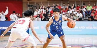 Ateneo de Manila University Blue Eagles’ Jared Bahay dribbles the ball against the defense of University of the East Red Warriors’ Reiner Maga. UAAP PHOTO