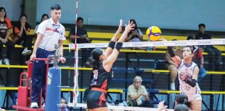 Negros-ICC Blue Hawks’ Andrea Caparal tries to score against a Quezon Province Tangerines’ player. MPVA PHOTO