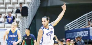 D’Navigators-Iloilo’s Vince Abrot tries to score against a Cignal HD Spikers’ defender. PHOTO COURTESY OF SPIKERS’ TURF