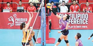 Choco Mucho Flying Titans’ Maika Ortiz scores against the defense of Capital1 Solar Energy Solar Spikers. PVL PHOTO