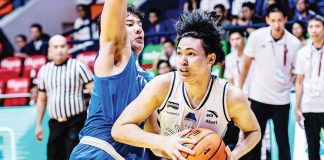 Adamson University Falcons’ Royce Mantua protects the ball from the defense of Ateneo de Manila University Blue Eagles’ Shawn Tuano. UAAP PHOTO