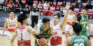 College of St. Benilde Blazers’ Allen Liwag protects the ball from the defense of San Beda University Red Lions’ Jomel Puno and John Bismarck Lina. Photo courtesy of NCAA/GMA Sports