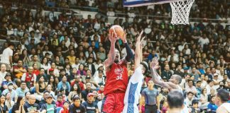 Barangay Ginebra San Miguel Kings’ Justin Brownlee shoots over the defense of TNT Tropang Giga's Rey Nambatac. PBA PHOTO