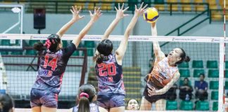 Quezon Tangerines’ Mary Grace Borromeo smashes the ball against two Biñan Tatak Gel 1-Pacman Partylist Volley Angels’ defenders. MPVA PHOTO
