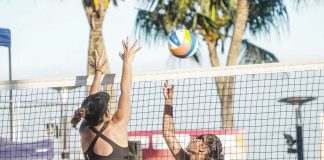University of Santo Tomas Tiger Sands’ Sofiah Pagara scores against a National University Lady Bulldogs’ defender. UAAP PHOTO
