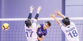 D’Navigators Iloilo’s Madz Gampong smashes the ball against the defense of VNS Griffins’ Kenneth Daynata. PHOTO COURTESY OF SPIKERS’ TURF