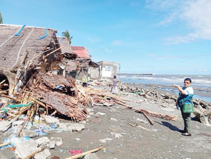 storm-surge-1 A storm surge destroyed several houses in Barangay Caano Baybay, Kalibo, Aklan on Nov. 19, 2024. PHOTO COURTESY OF MAYOR JOEN MIRAFLORES/FB PAGE