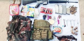 Troops of the 12th Infantry Battalion of the Philippine Army recovered these high-powered firearm and assorted war materiel after a gun battle with suspected New People’s Army rebels in Barangay Batobato, Tapaz, Capiz on Nov. 18, 2024. 3RD INFANTRY (SPEARHEAD) DIVISION PHOTO