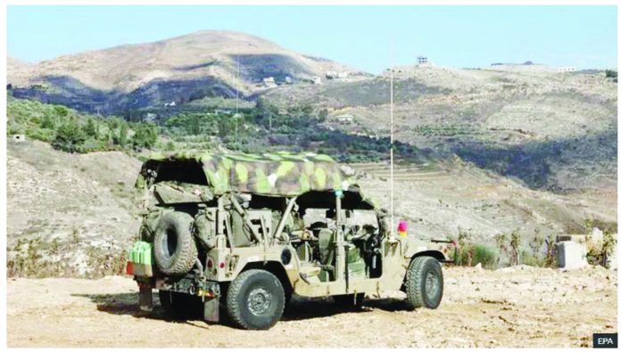 Israel.JPG_resized Israeli forces are stationed near Majdal Shams in the occupied Golan Heights in Syria. EPA