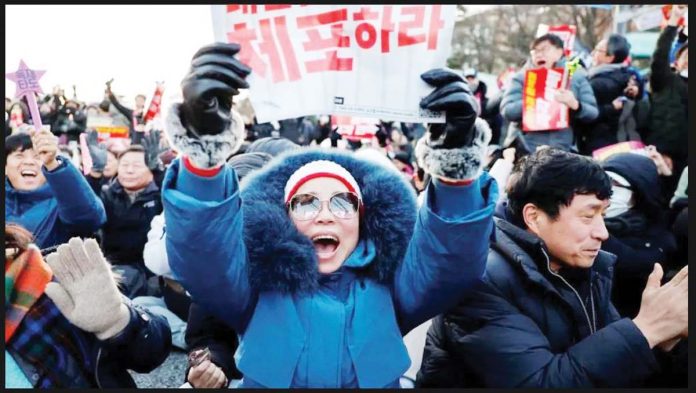 Korea-1 Tens of thousands of people had come out in protest since President Yoon Suk Yeol's short-lived martial law order. GETTY IMAGES