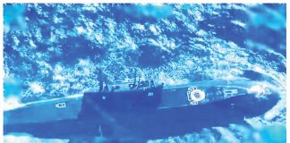 Contributed photo shows the Russian Navy’s Ufa submarine surfacing on Philippine waters Thursday last week, November 28. The 74-meter-long vessel is capable of firing Kalibr cruise missiles, which were used recently against Ukraine.