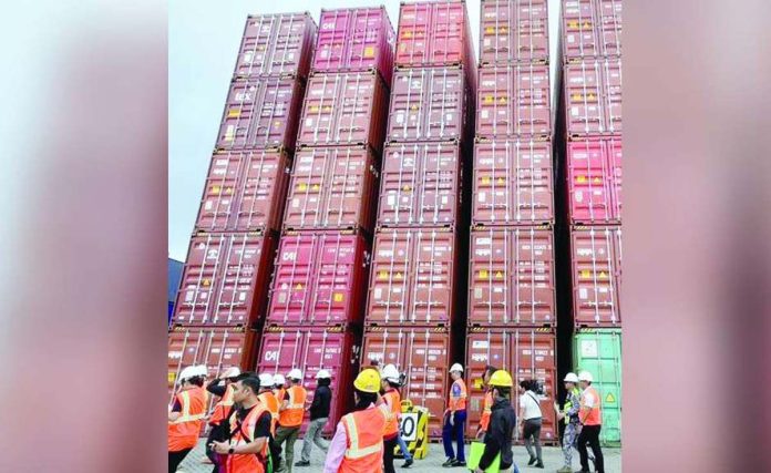 PPA-containers Almost half a million sacks of rice in more than 800 shipping containers were uncollected at the Manila International Container Terminal in September this year, according to the Philippine Ports Authority. JERVIS MANAHAN/ABS-CBN NEWS PHOTO