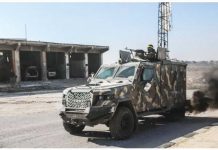 Syria rebels launch major offensive Rebel fighters led by Hayat Tahrir al-Sham (HTS) drive an armored vehicle during an offensive against government forces in north-western Syria. ANADOLU