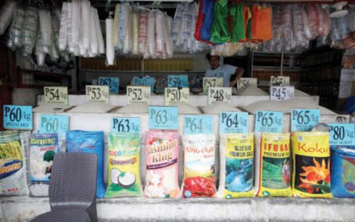 economist_on_inflation_resized_resized Various rice varieties sell from P45 to P80 per kilogram at a retail store in San Andres, Manila on Dec. 10, 2024. Rizal Commercial Banking Corp. chief economist Michael Ricafort said on Wednesday, Dec. 25, 2024, that inflation would continue to settle within the government's target due to lower rice prices. PNA PHOTO BY YANCY LIM