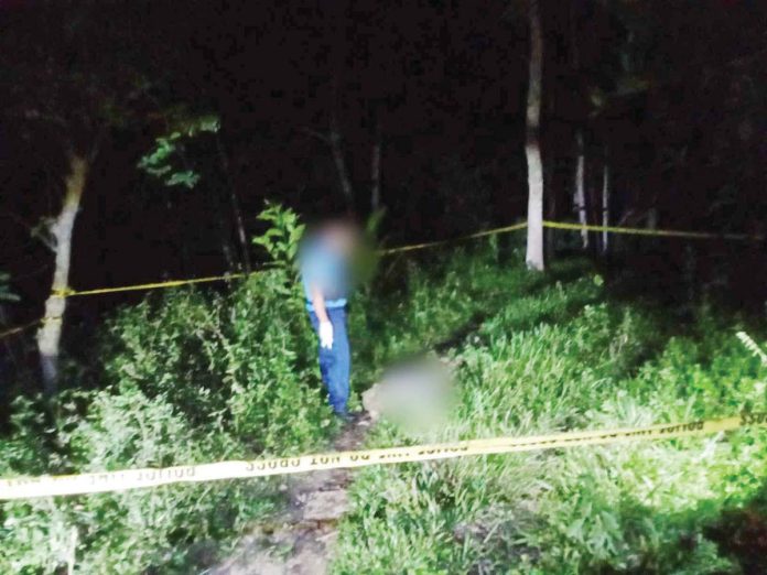 farmer_found_dead_resized Police investigates the area in Barangay Omio, Lemery, Iloilo where Ney Palma Parcon was found dead early Monday morning, Dec. 16, 2024. K5 NEWS FM SARA DIGITAL PHOTO