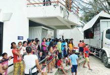 NEGROS TO DECLARE ‘STATE OF CALAMITY’; Kanlaon eruption displaces nearly 20K in 5 NegOcc towns, cities The Department of Social Welfare and Development distributes food packs to residents of La Castellana, Negros Occidental displaced by the eruption of Kanlaon Volcano. The eruption affected a total of 7,294 individuals from eight La Castellana barangays. SERBISYO AÑEJO/FACEBOOK PHOTO