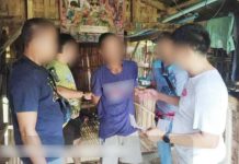 A 38-year-old man (center), tagged as Negros Occidental’s eighth most wanted, was arrested through the strength of an arrest warrant in Barangay Mandu-ao, Bayawan City, Negros Oriental on Dec. 20, 2024. The subject is presently at the police custody pending turned over to court concern.