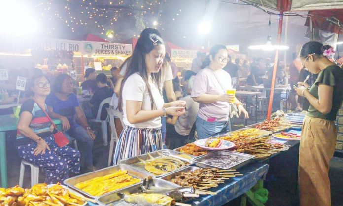 night_market_pic_resized The three-day Calle Real Christmas Street Night Market from Nov. 15 to 17, 2024 was filled with food, drinks, entertainment, shopping, and cultural showcases, drawing locals and tourists alike. JERRY TREÑAS/FACEBOOK PHOTO