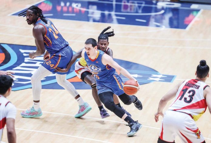 sporsts_Bolick_resized NLEX Road Warriors’ Robert Bolick Jr. eludes the defense of San Miguel Beermen’s Jaymar Perez. PBA PHOTO