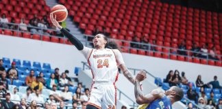 NorthPort Batang Pier’s Joshua Munzon stretches for a layup. PBA PHOTO